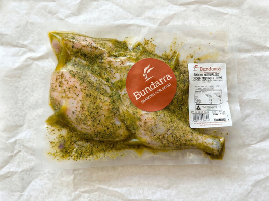 Packaged chicken with Bundarra label on a white background